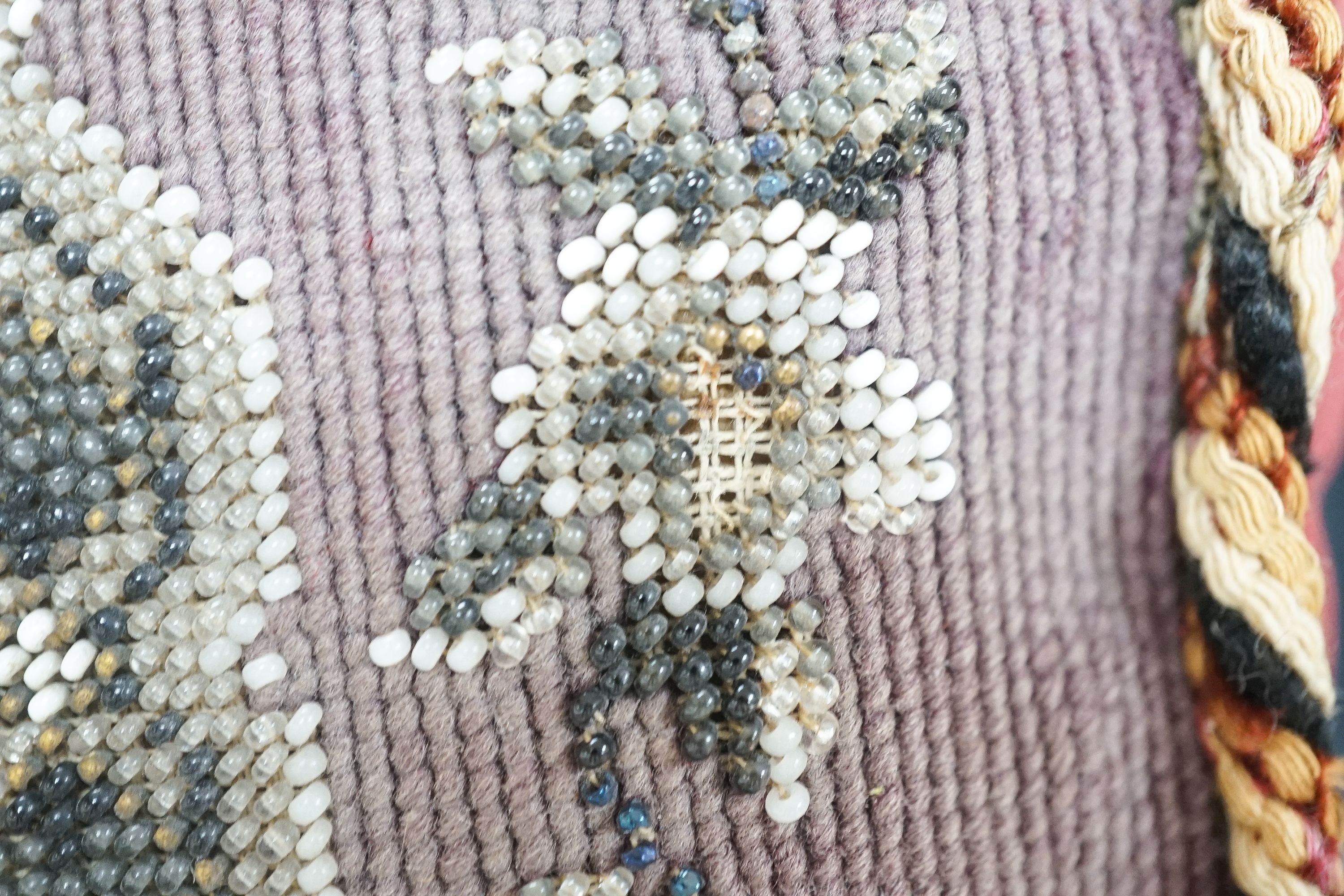 A 19th century wool worked chair seat and back and a 19th century Berlin bead worked cushion